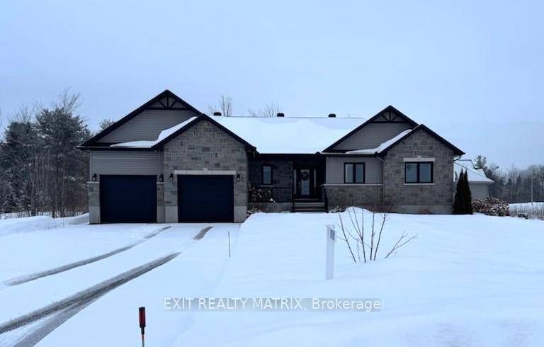 This Stunning custom built bungalow in Bourget, completed in 2017, is perfect for families looking for comfort and convenience.