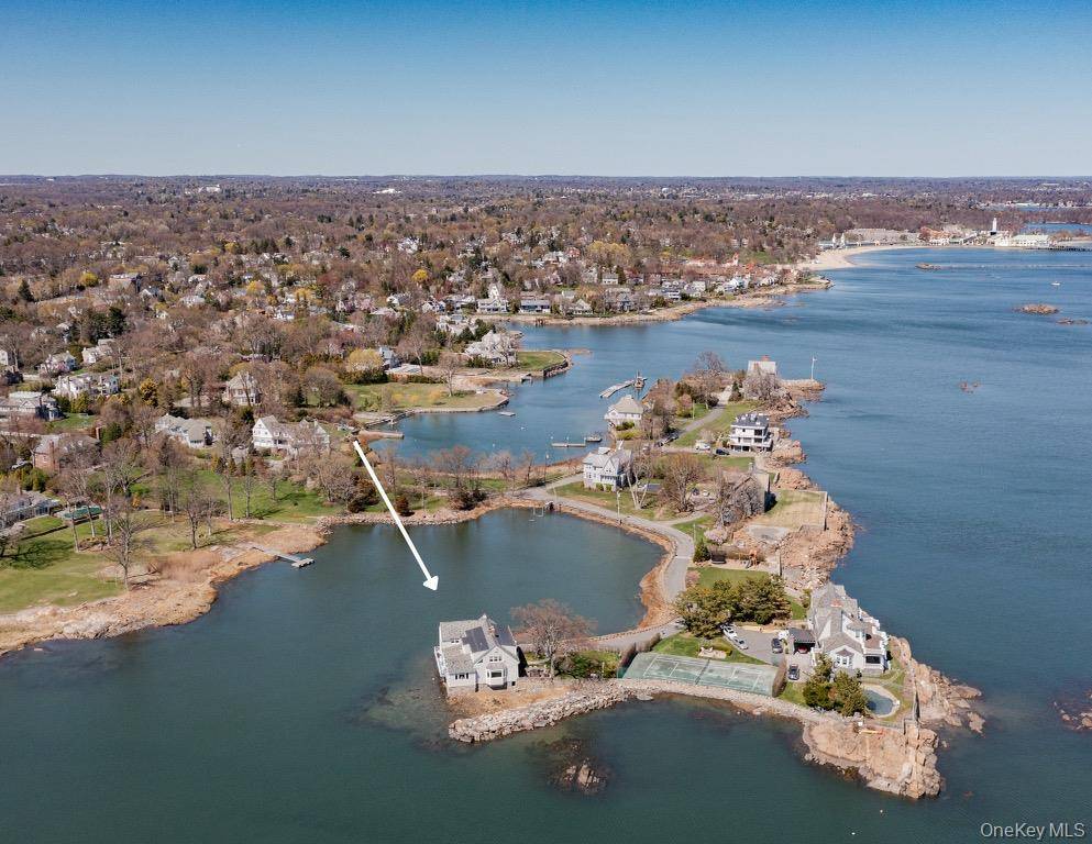 Prepare to be captivated by this exceptionally rare rental opportunity on exclusive Pine Island in Rye, NY.