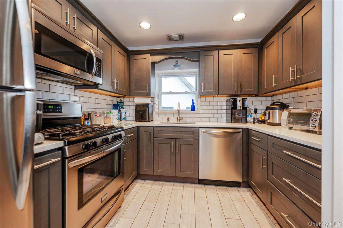 Beautiful, Beachside 2 bedroom Condo UPPER Townhouse with balcony off of living room.