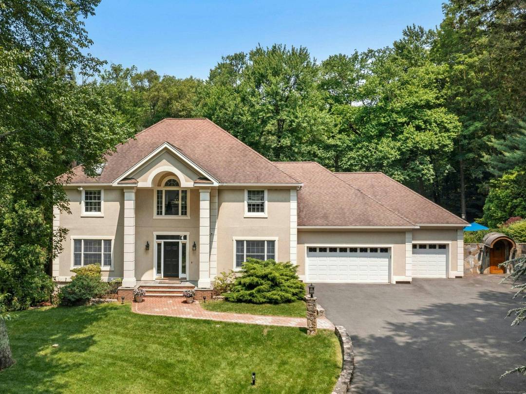 Nestled at the end of a serene cul de sac is a 4 acre sanctuary where luxury and enchantment intertwine.