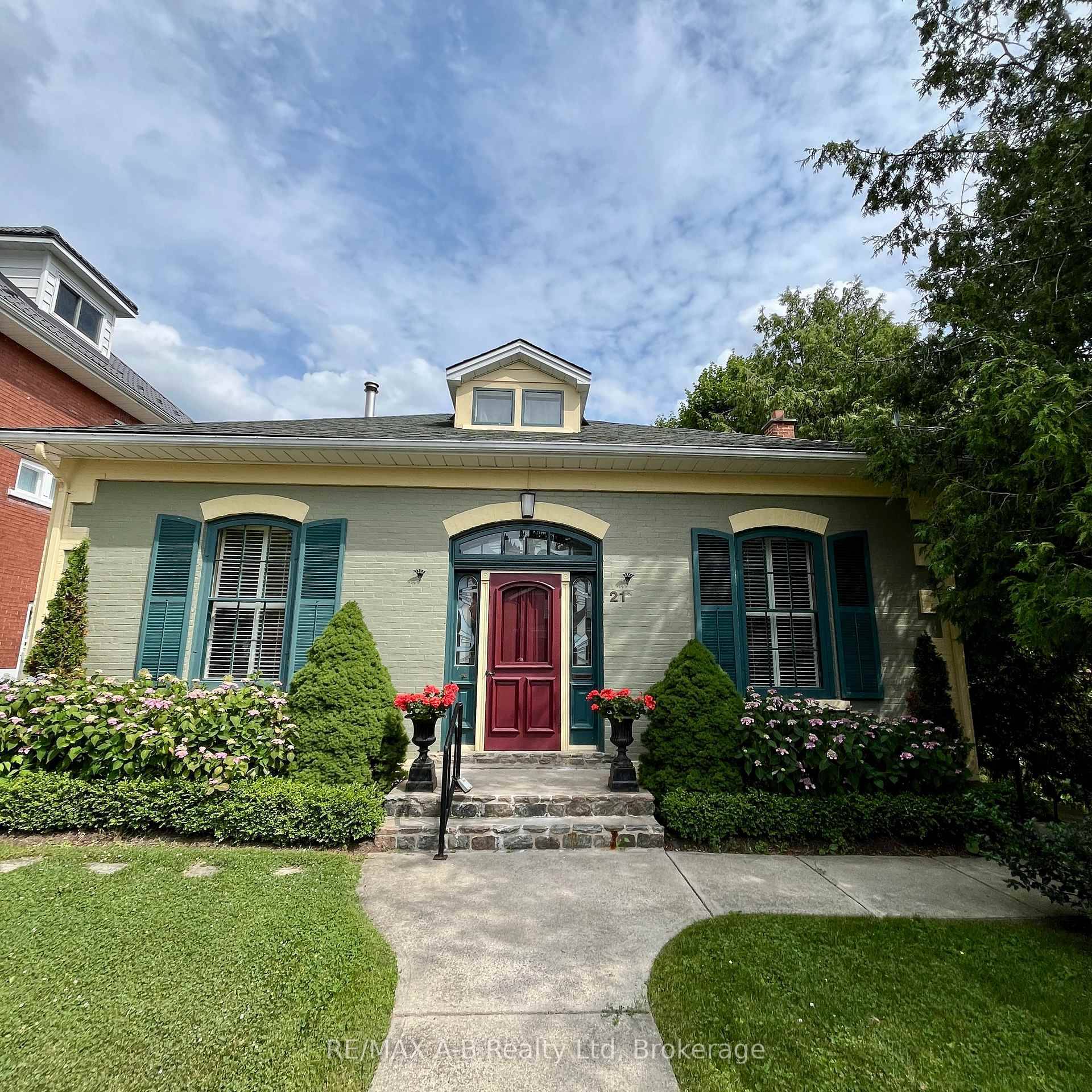 A rare and beautiful Regency cottage just steps from the vibrant cultural hub of downtown Stratford, Ontario.
