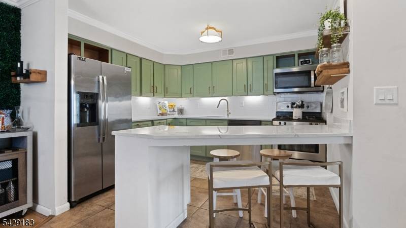 Welcome Home ! Discover this beautifully updated 2 bedroom, 2 bathroom townhouse in the highly sought after Carlton Hill, tucked away on a quiet cul de sac.