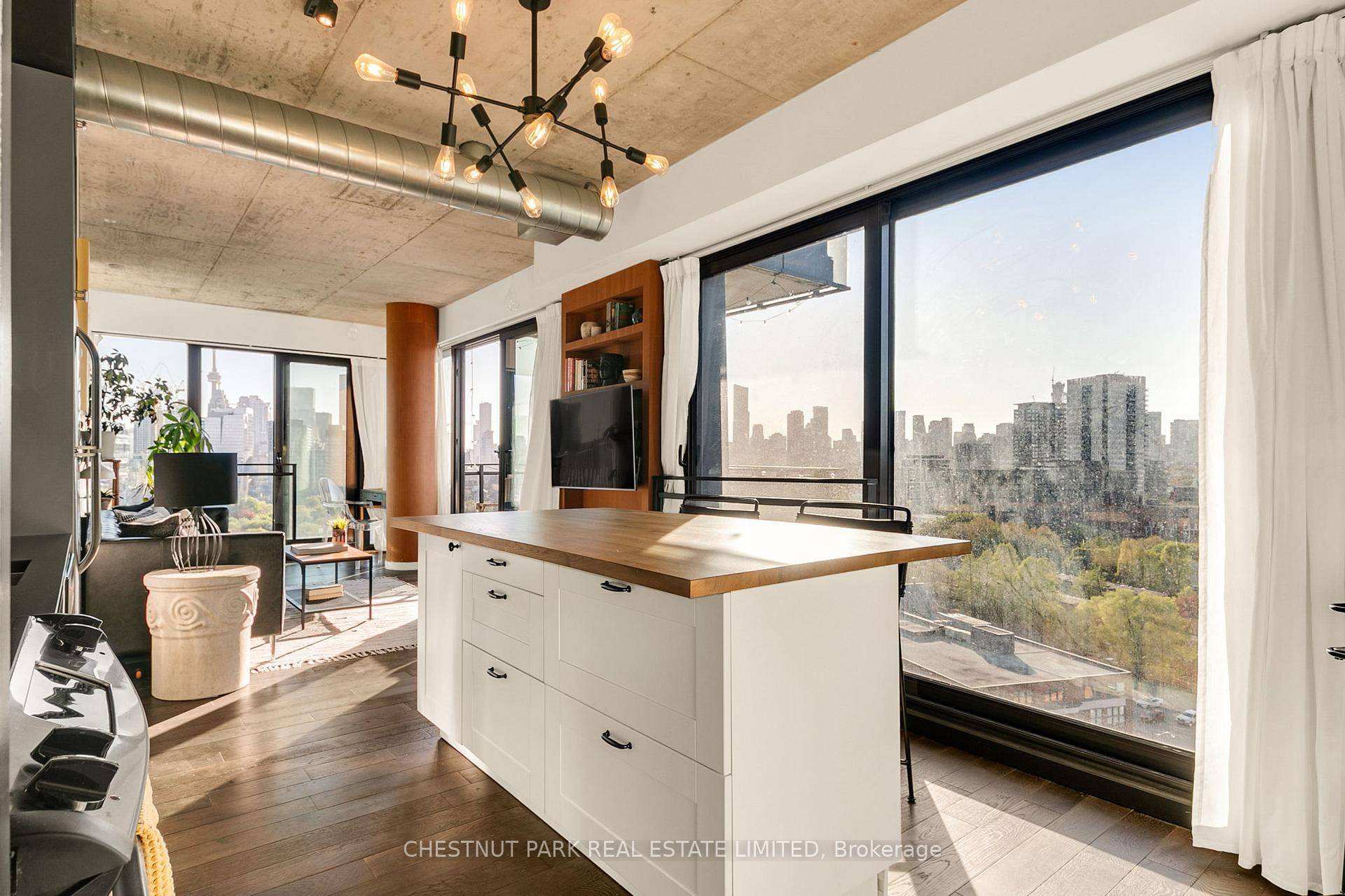 Welcome to your next level lifestyle in this rare Sub Penthouse corner suite at River City 1 a bold, design forward building perfectly located just steps from the Distillery District.