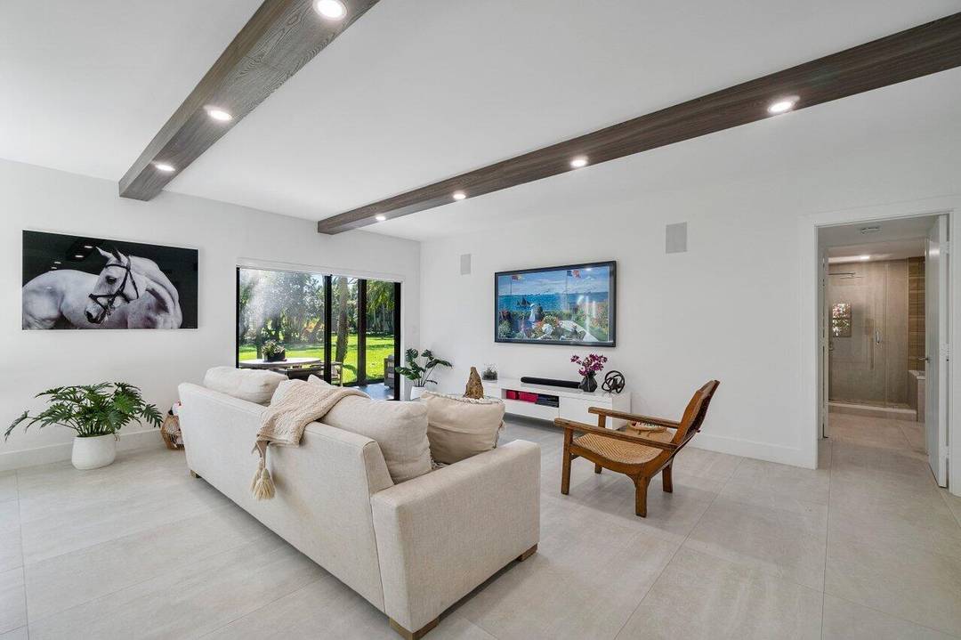 This bright and inviting ground floor corner condo offers a rare opportunity to own a renovated 3 bedroom, 3 bathroom residence in the desirable Polo Club.