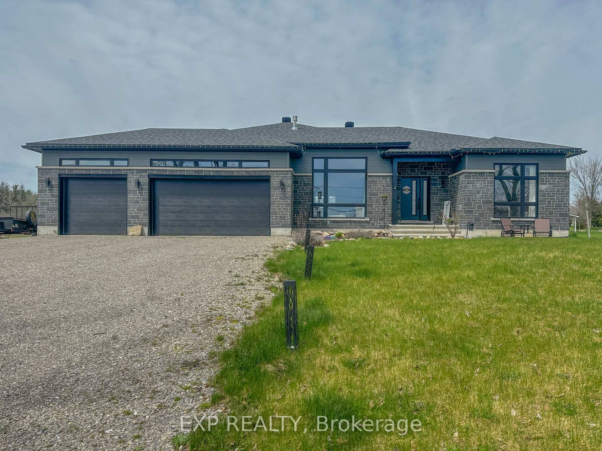Welcome to 4 Tracy Lane where modern comfort meets country charm !