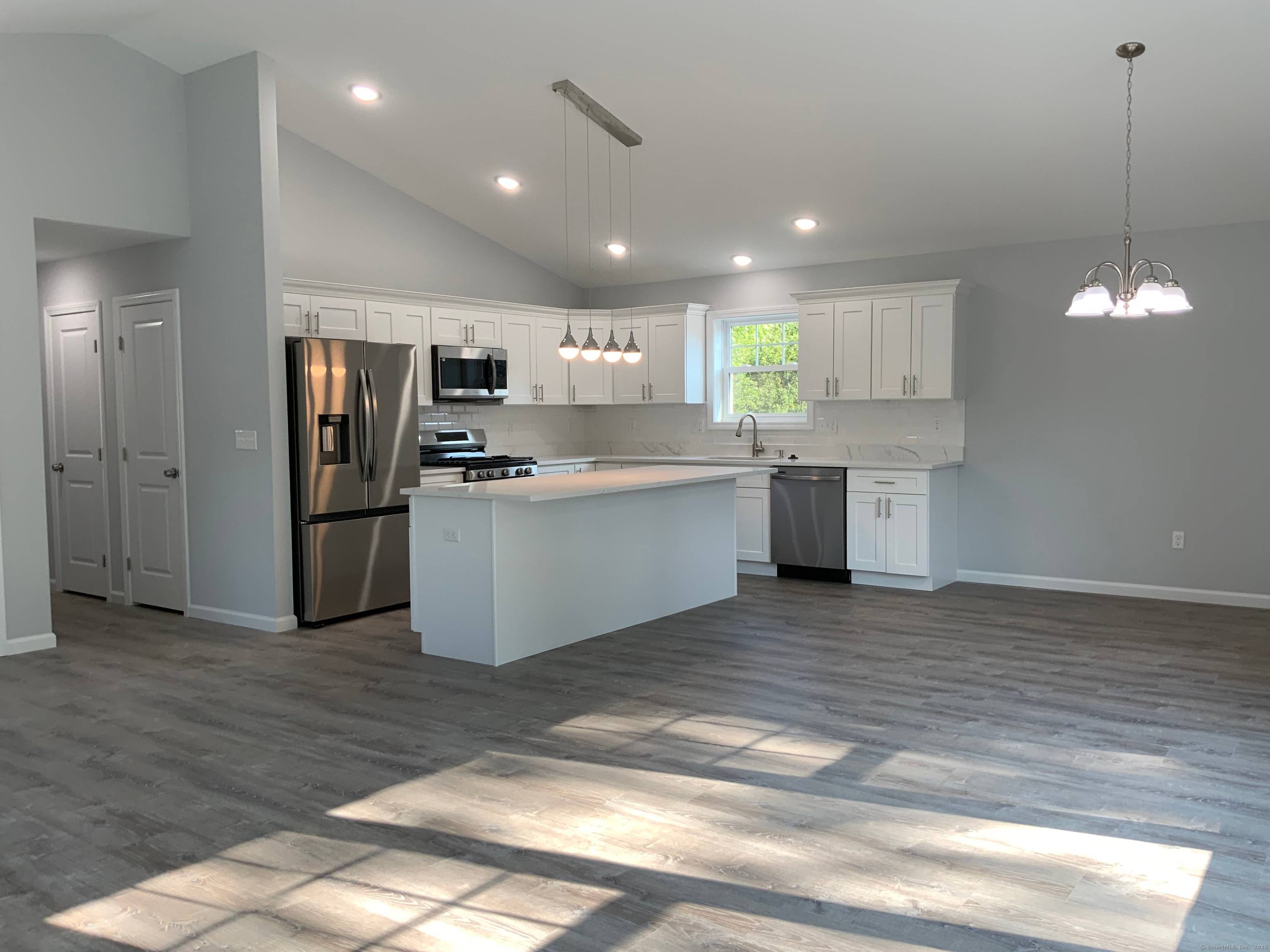 Experience modern living in this brand new 3, 456sq ft split level home, located in a quiet New Haven neighborhood.