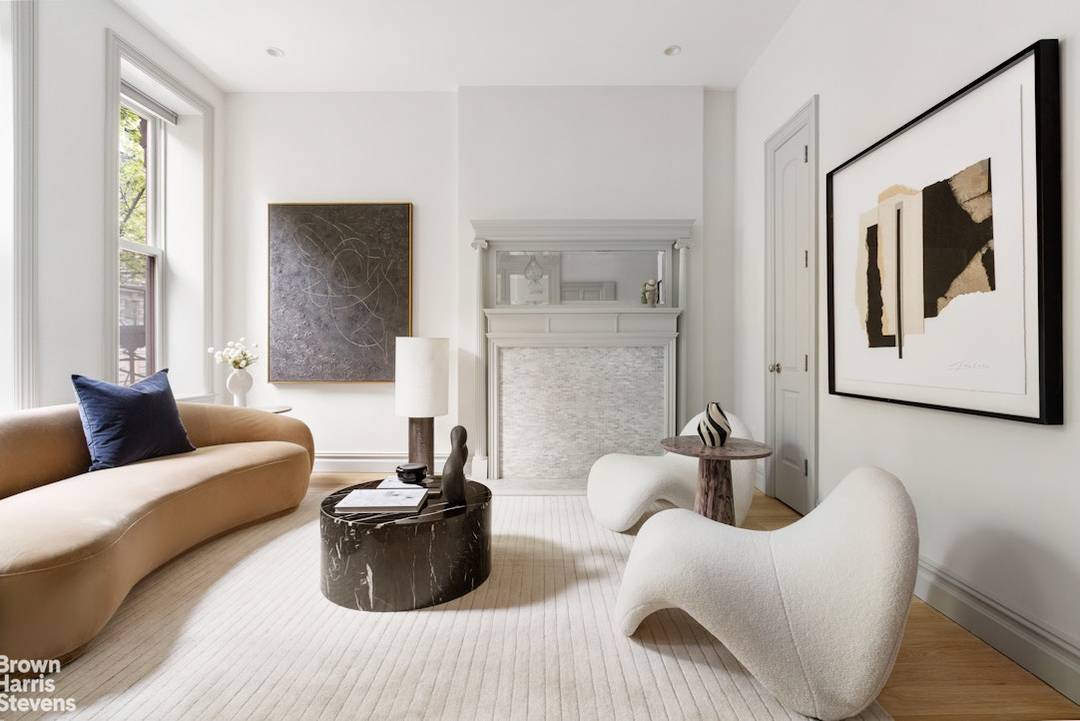 This exceptional prime South Harlem townhouse is a study in scale, privacy, and elevated design featuring five bedrooms, five full bathrooms, two powder rooms, a private elevator, expansive outdoor space, ...