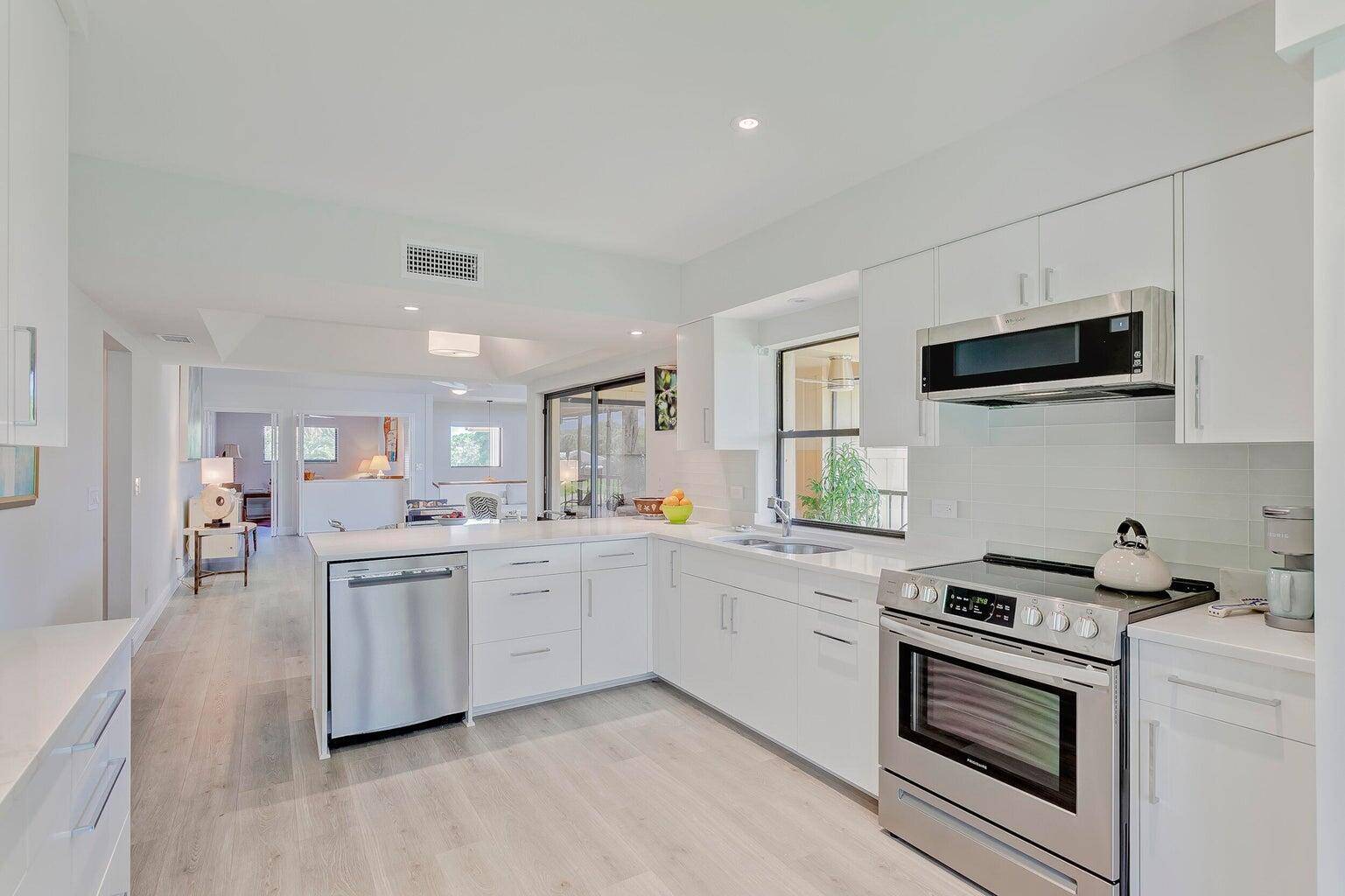 This beautifully updated 2 bedroom, 2 bathroom condo with a versatile den perfect as a third bedroom or home office is located in the highly sought after Waterbend community of ...