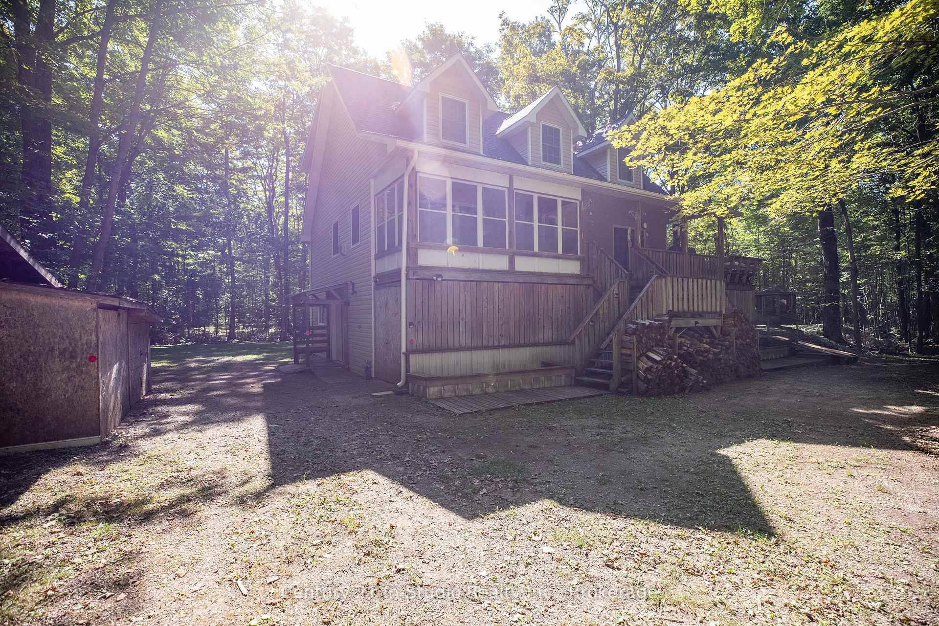 Escape to your private 28 acre retreat at Tammys Cove, just across from beautiful Miller Lake, where this 2005 built, 3 storey, 4 season home blends comfort, space, and stunning ...