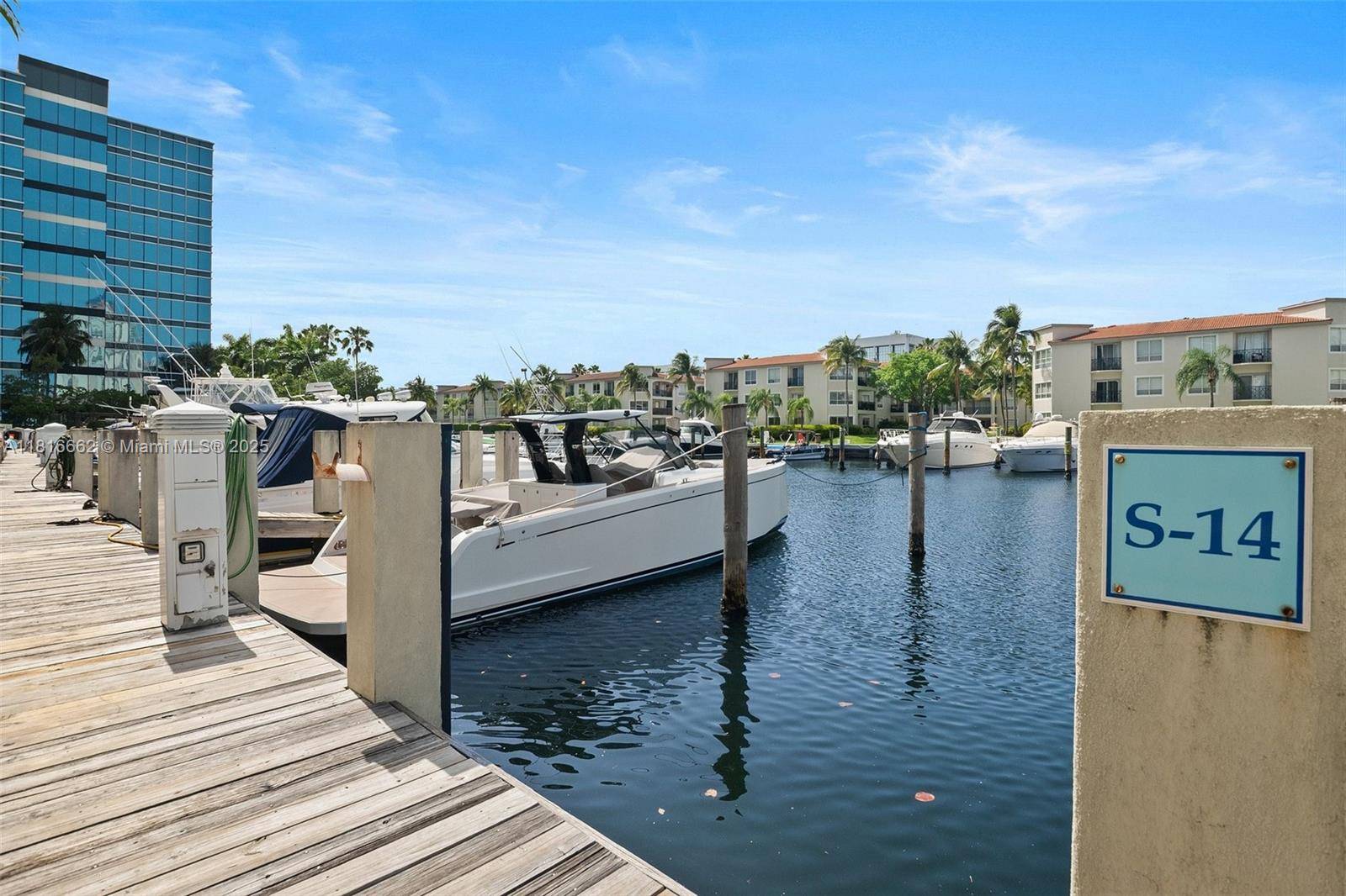 Boaters dream 60ft Boat slip with Luxurious Marina Loft condo, with two parking spaces.