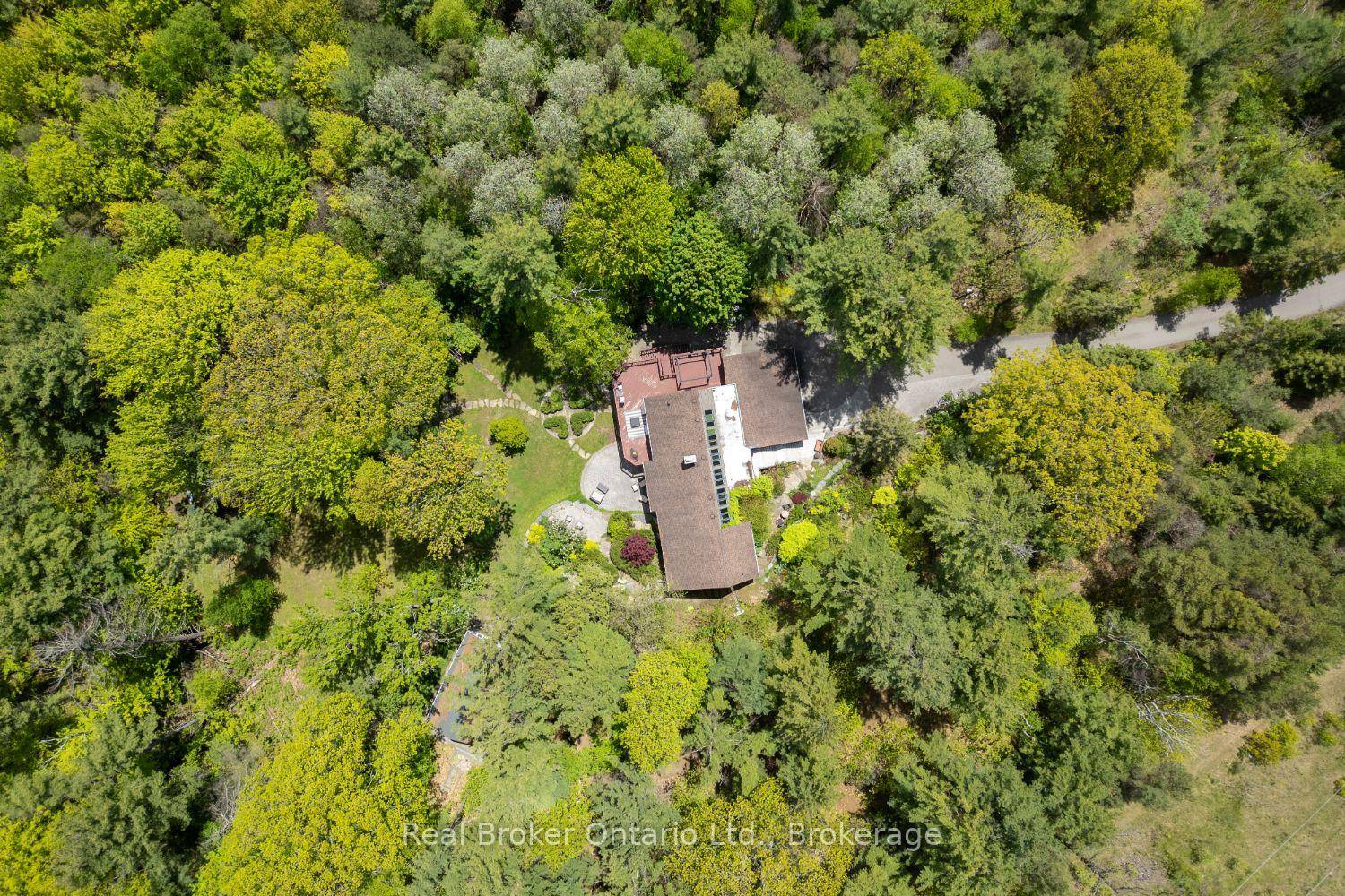 Set amongst mature trees, on approximately 6.
