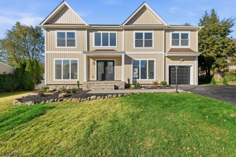 Discover modern luxury in this 5 bedroom, 5 bath home in the heart of Clark, NJ, within a top rated school district.