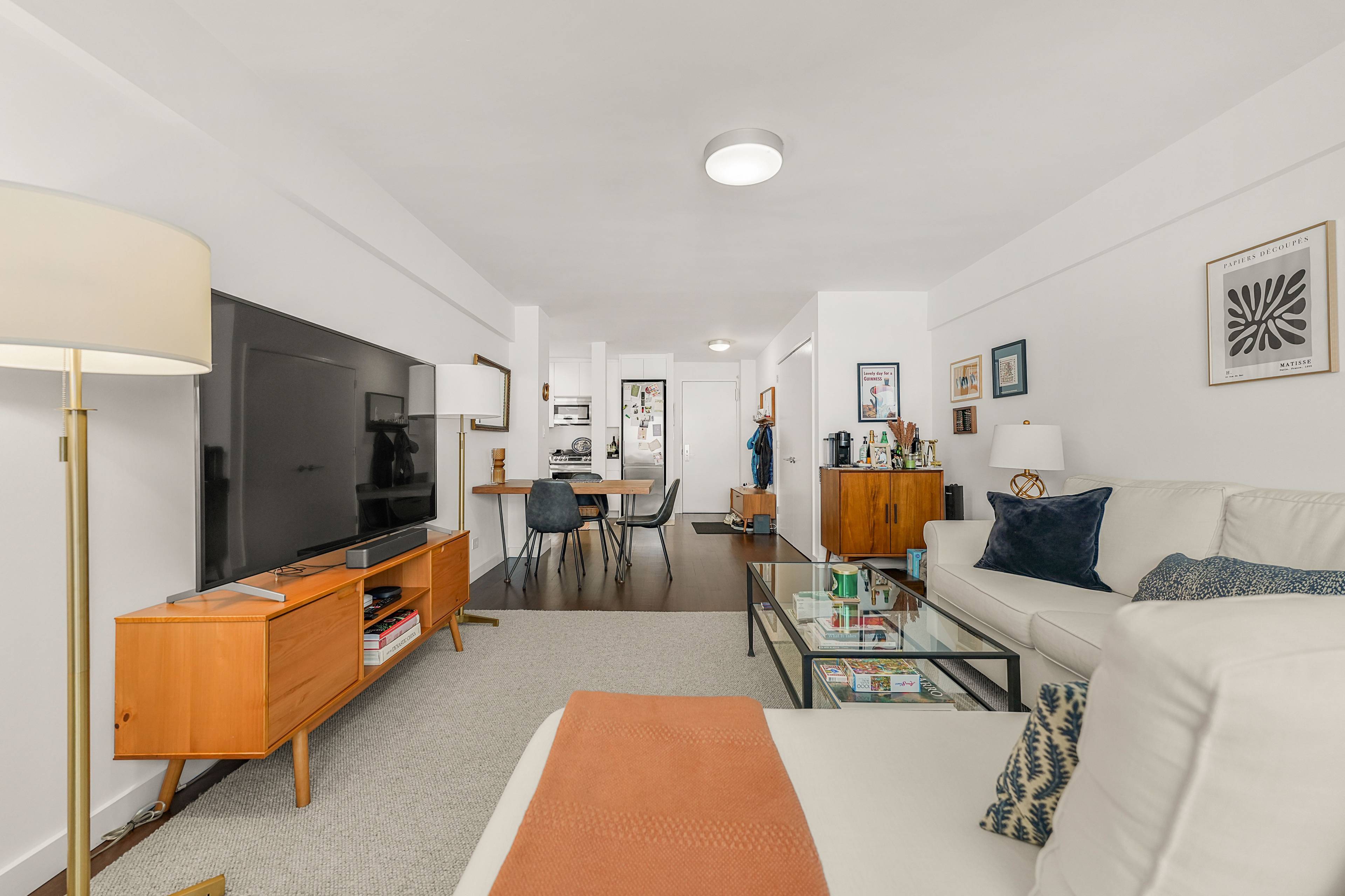 This bright and airy north facing unit showcases a thoughtfully refined layout with sophisticated high end finishes throughout.