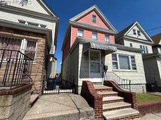 Maspeth completely detached legal 2 family frame home.