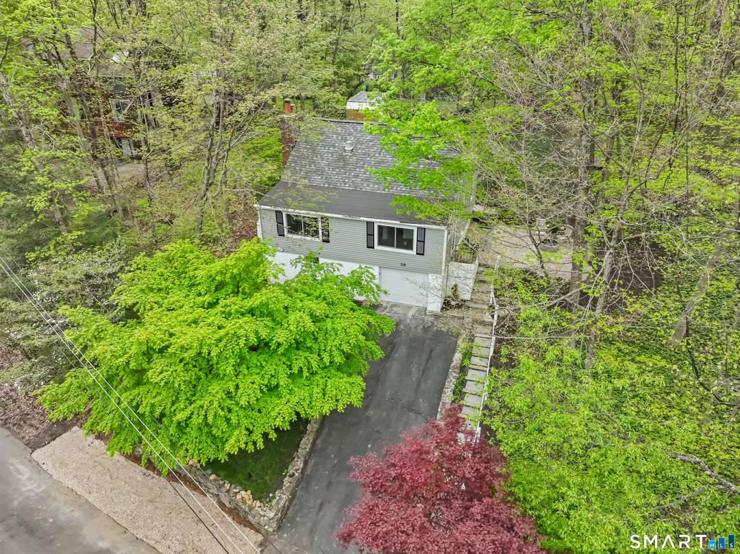 Inviting, renovated ranch in the peaceful Rainbow Lake community of Ridgefield, Connecticut.