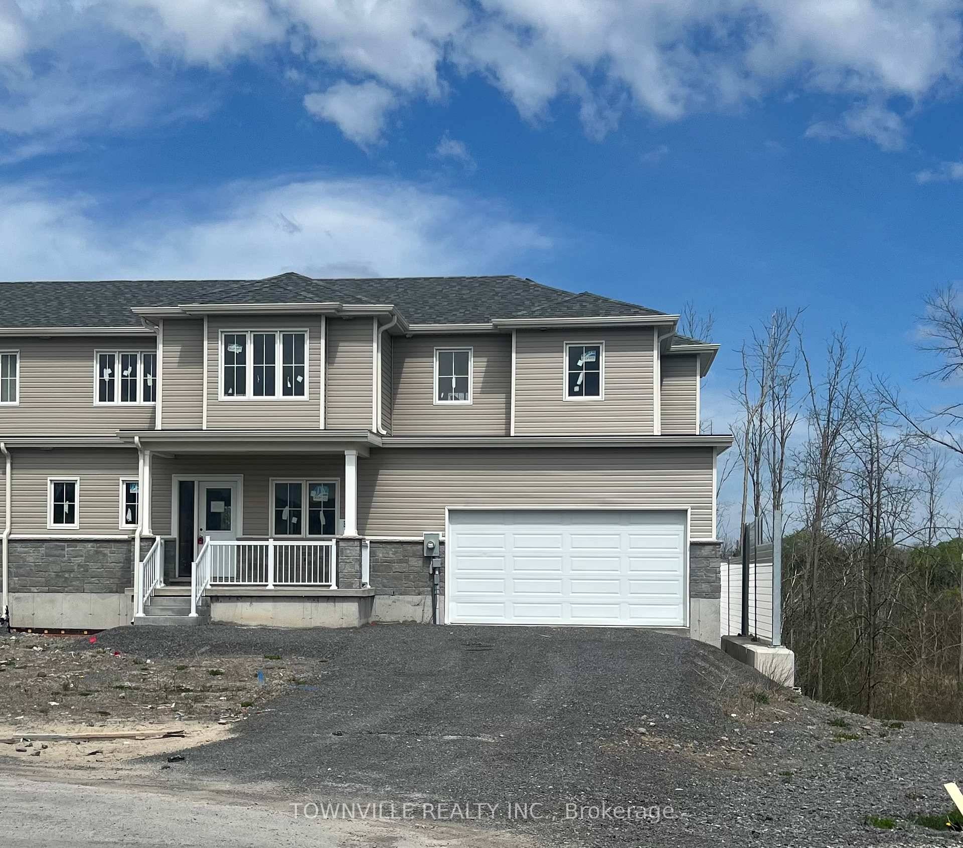 Welcome to this brand new move in ready Premium Corner Lot Freehold End Unit with Private Double Driveway, No Condo or POTL Fee.