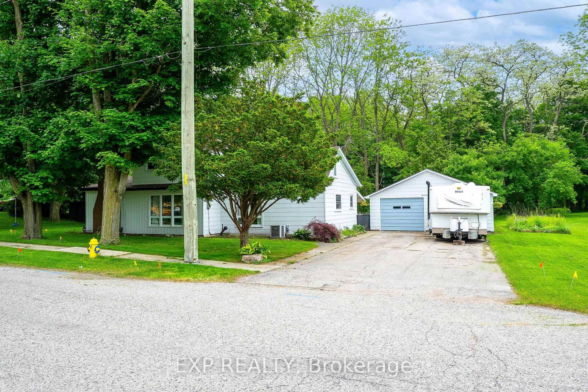 Welcome to this serene and spacious home tucked away on a quiet cul de sac in the charming Village of Otterville.