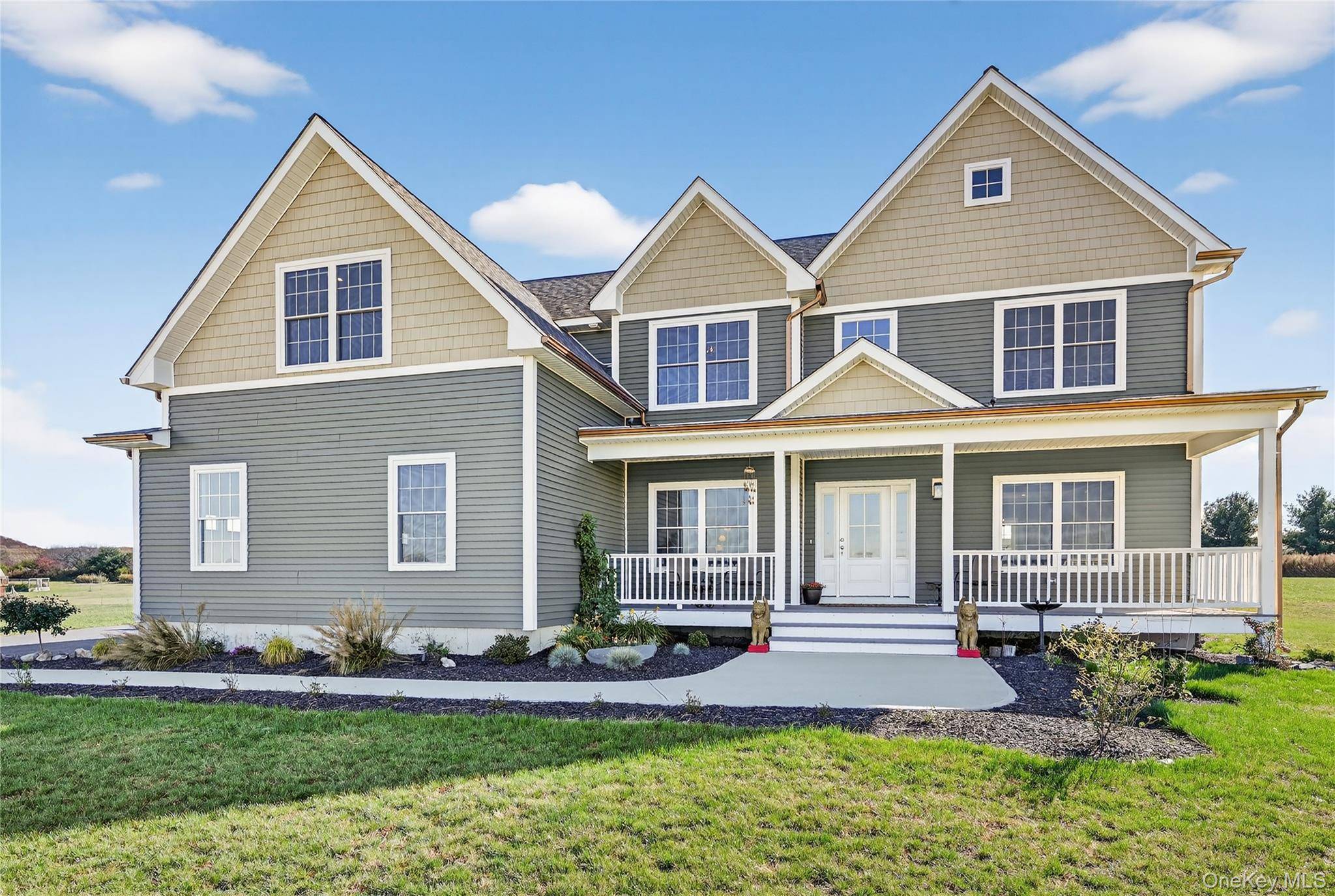 Views abound from this stunning colonial in the Warwick Ridge Sub Division.