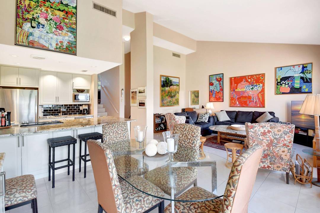 Welcome to this stunning corner unit at the Delray Racquet Club.