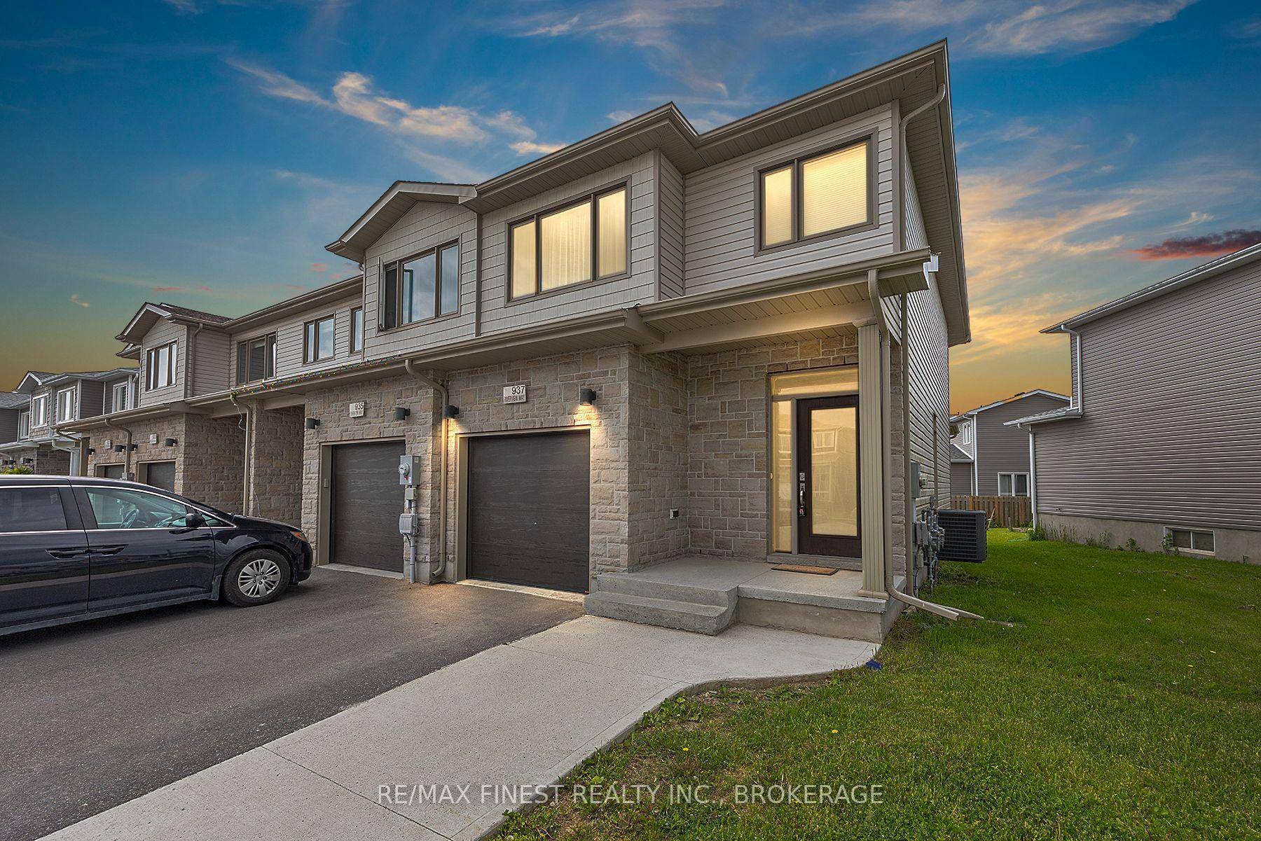 LOCATION, LOCATION... Welcome to this stunning East End of Kingston end unit townhouse with attached garage.