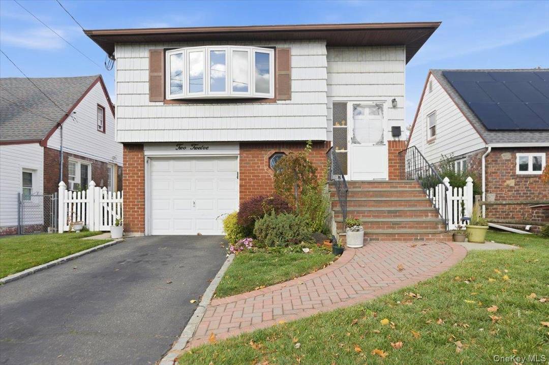 Welcome to this well loved home in the heart of Malverne, offering spacious rooms, great natural light, and wonderful potential.