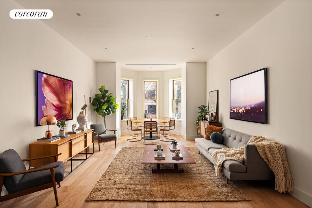 Welcome to 148 Clinton Avenue, where three very rare homes offer grand loft like living spaces with the warmth and intimacy of an historic townhouse.