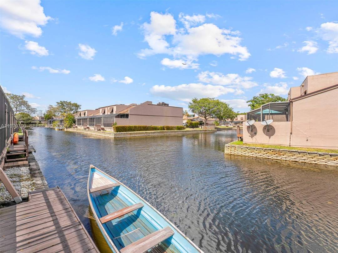 Welcome home to this beautifully maintained 3 BR, 2 BA townhome nestled inside the highly sought after gated waterfront community of Flamingo Villas, where comfort, charm, and lifestyle come together.