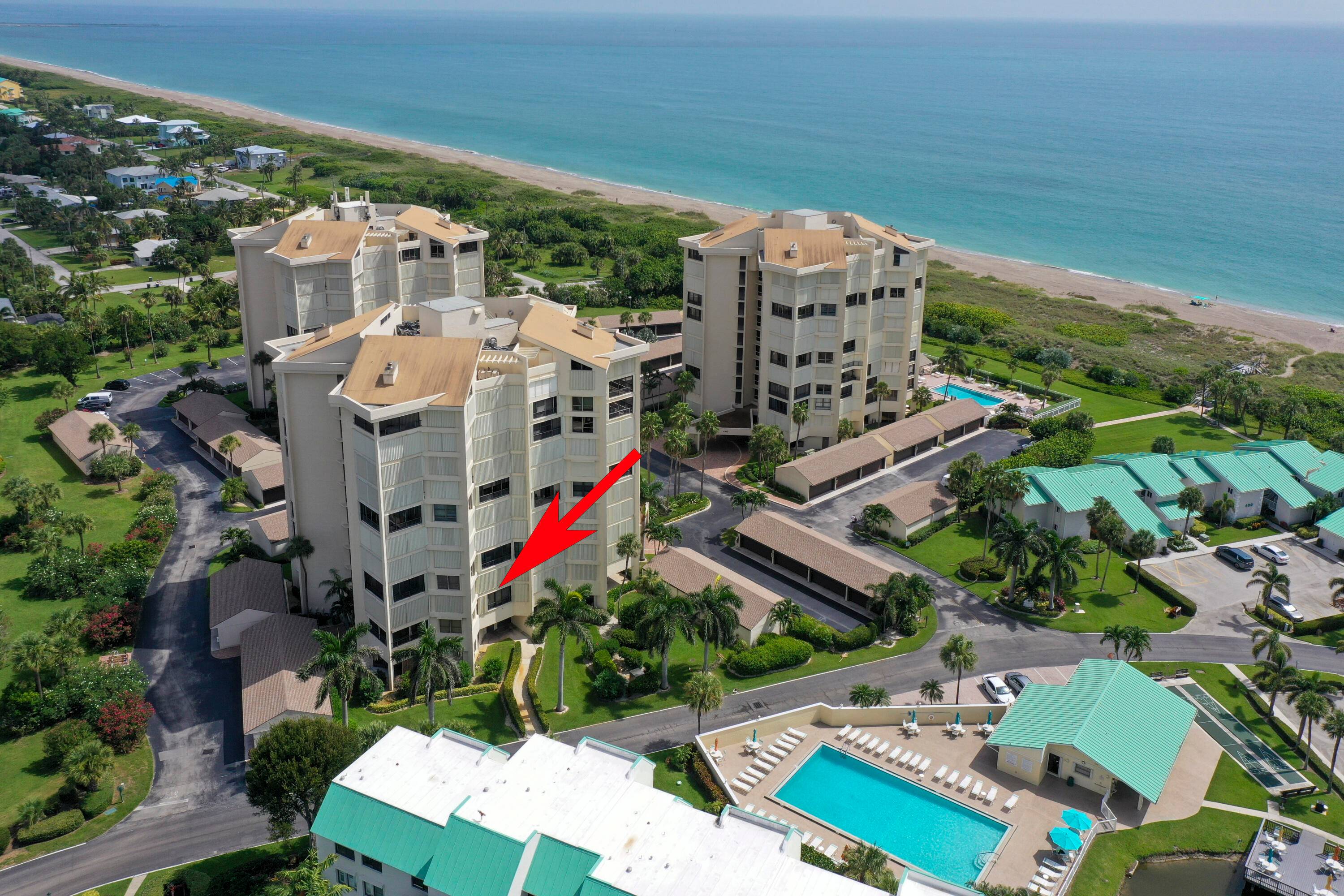 Beautifully updated 2 bedroom, 2 full bath turnkey unit, with shared garage, each bedroom having it's own lanai, views over golf course and pool, partial impact glass.