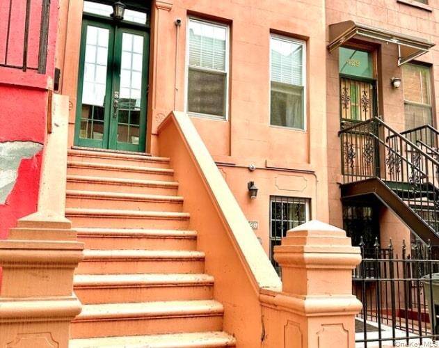 Spacious and well maintained 2 family townhouse in East Harlem featuring, custom finishes, and great rental potential.