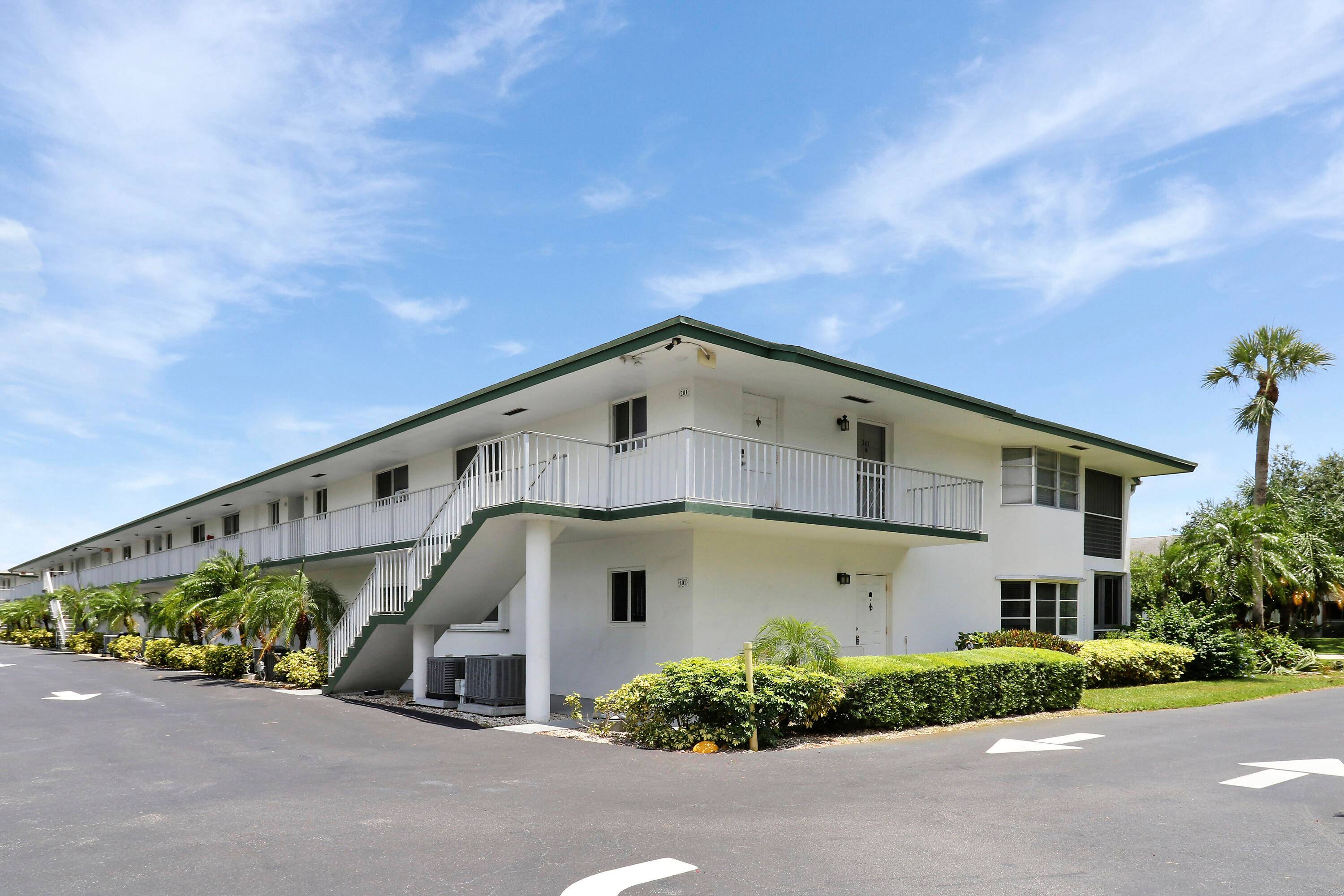 Renovated ground floor end unit in the sought after Tequesta Gardens community.