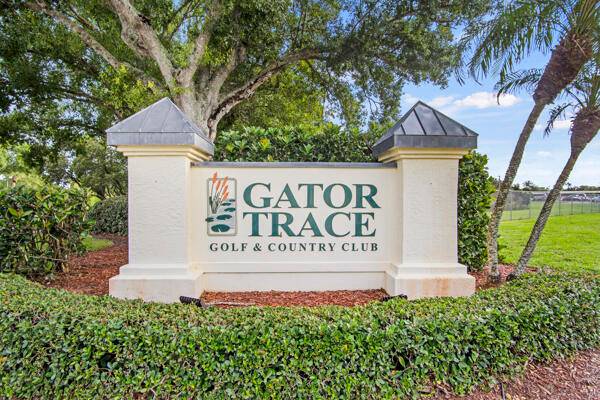 Don't miss this 1st floor unit on the 3rd hole of Gator Trace Golf Course.