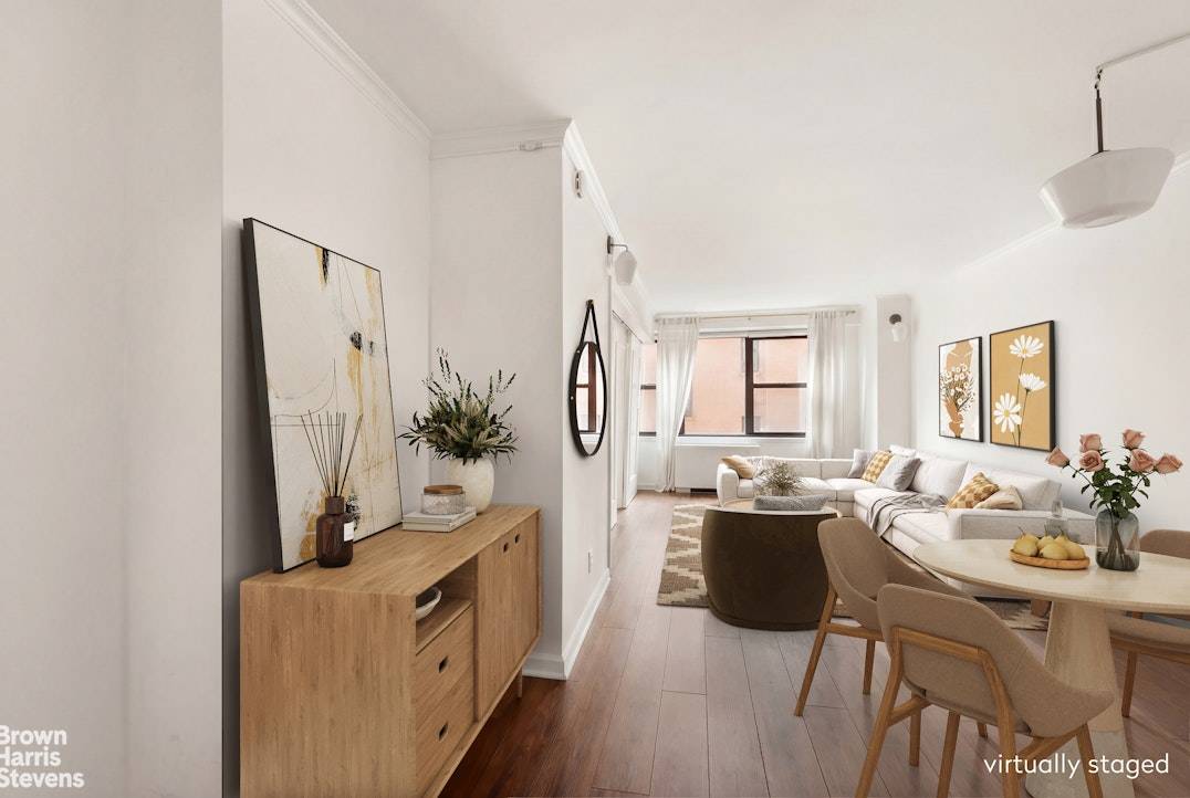 Beautiful, bright and and spacious south facing alcove studio features mounted barn doors separating the living room and bedroom area.