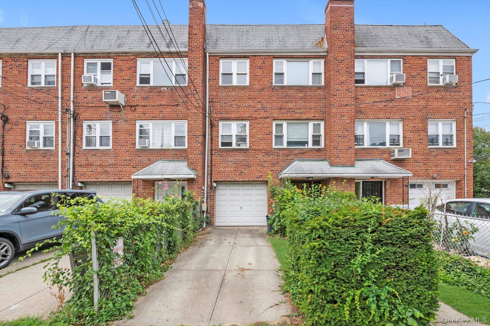 This is a Beautiful attached brick 2 family house located in the heart of Bayside.