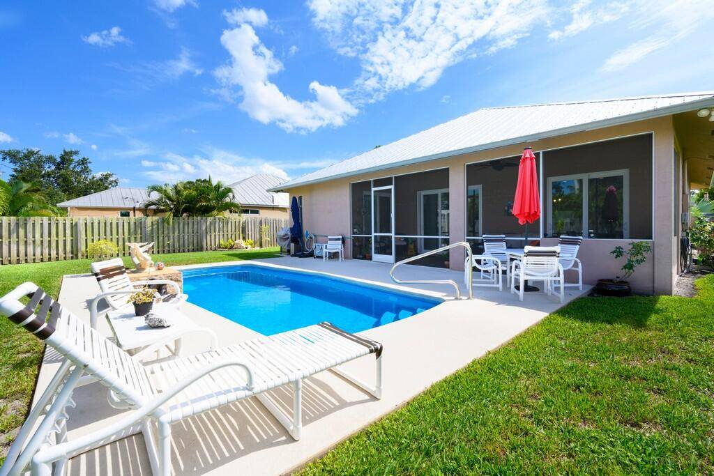 Discover Amazing Value in this Newer 4 Bedroom Custom Built Concrete Block Pool Home !