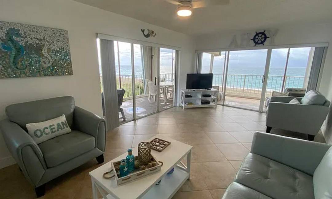 Experience beachfront living at its finest in this fully furnished 2 bedroom, 2 bath corner unit at the sought after Atlantis Condominium in Jensen Beach.