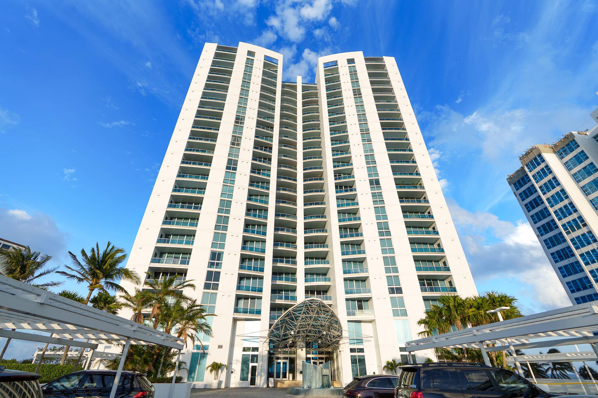 4 Garage Spaces at this sophisticated coastal condo 3 bed, 4.