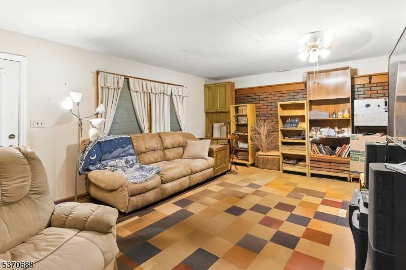 Nestled on a private flag lot, this spacious single family home offers peace, privacy, and opportunity.