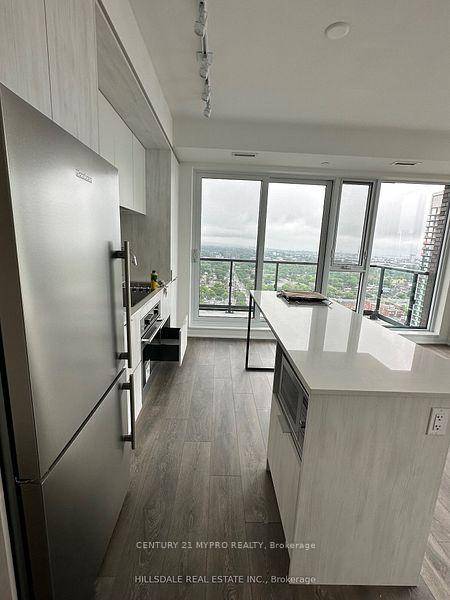Stunning corner high floor unit with amazing south east west lake views !