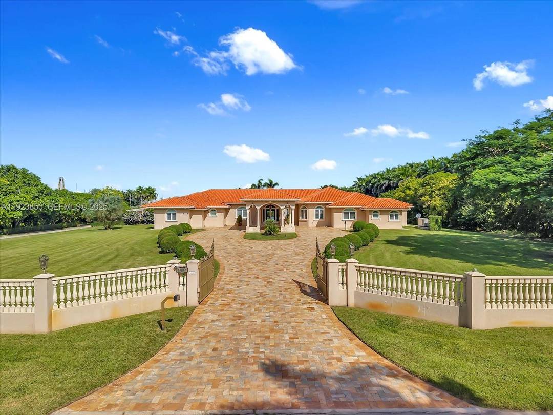 Welcome to this exquisite gated Mediterranean estate in highly sought after West Kendall, offering 5, 405 sq ft of refined living space, including 5 bedroom suites each with its own ...