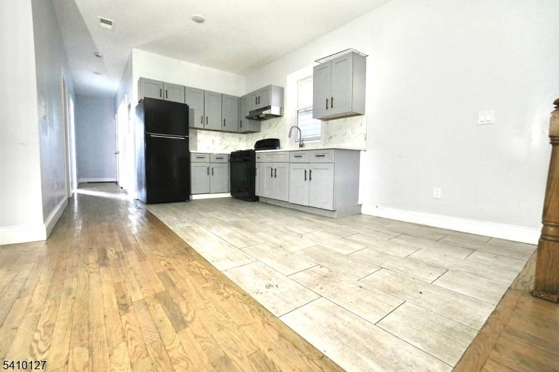 Beautifully renovated 2 family property featuring 9 bedrooms and 4 full bathrooms.