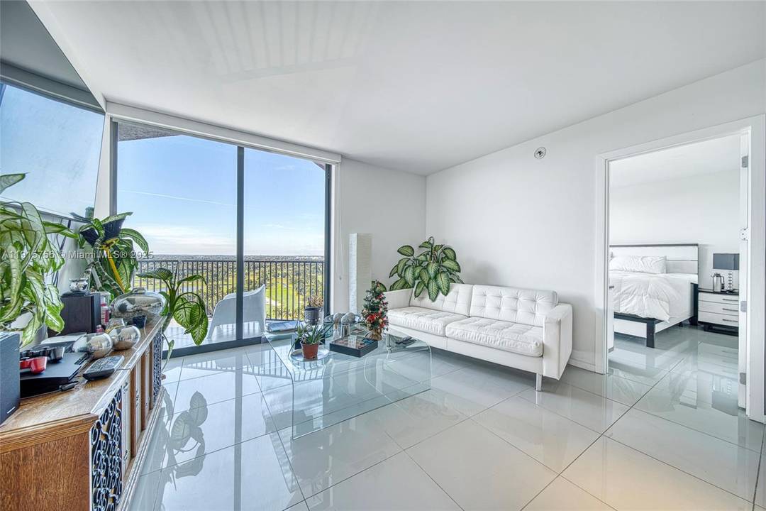 Magnificent 2Bdr 2Bath Large Den Condo in Downtown Doral with uninterrupted Golf Course views and endless Sunset Views.