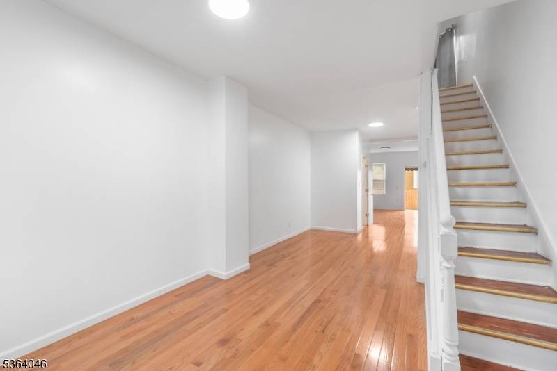 This well maintained attached single family home features 3 bedrooms and 1.