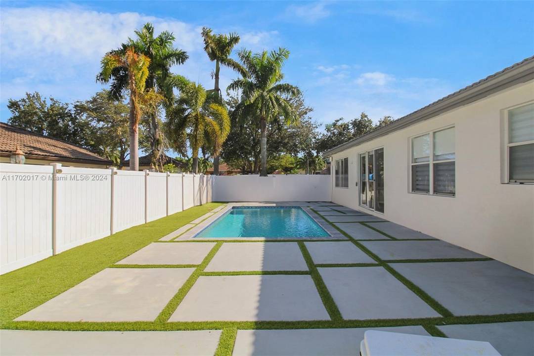 Welcome to your dream home in the heart of Miami Lakes !