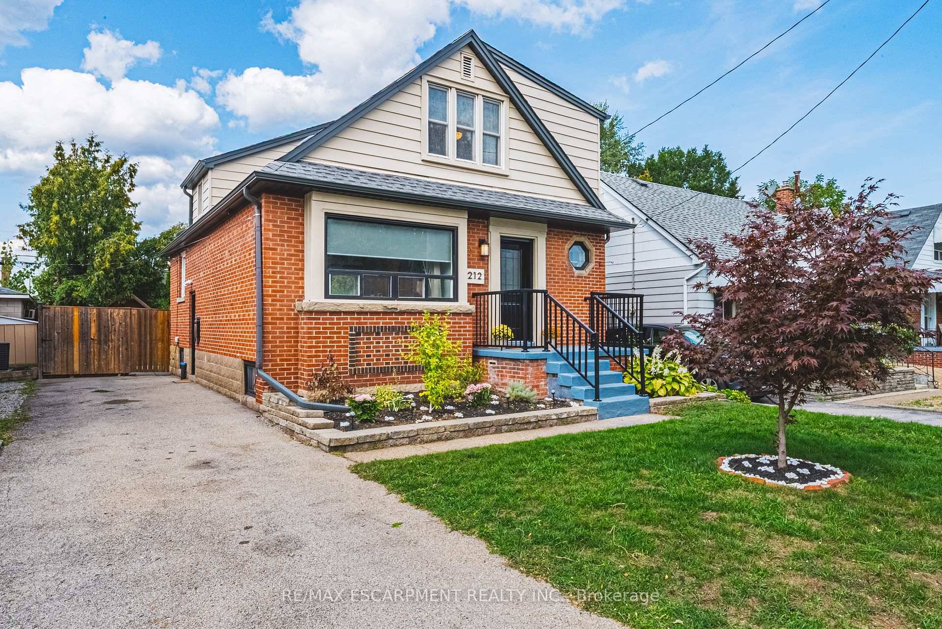 Discover this charming property at 212 Rodgers Road, a stunning detached home that seamlessly blends historic brick curb appeal with modern upgrades.