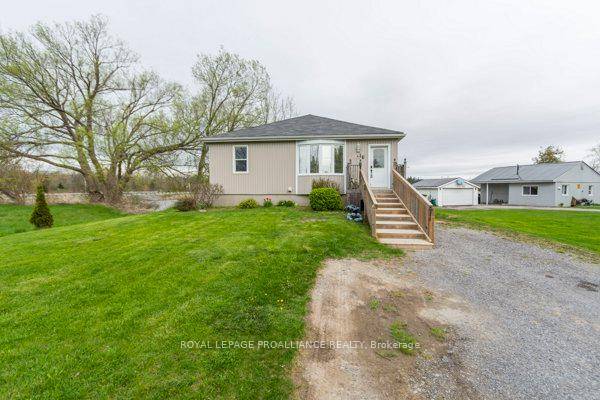 Waterfront bungalow with a loft and an inlaw suite.