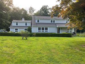Pillar Way Private Farmhouse Colonial Estate on almost 3 acres of Pond, Stonewalls, set back over 300 feet from road with a paved driveway.