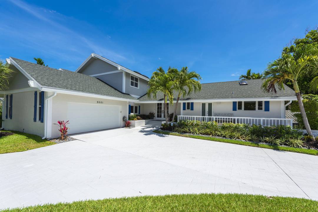 Experience coastal elegance in this stunning 5 bedroom, 4 bath beach style home in Tropic Isle, Delray Beach.