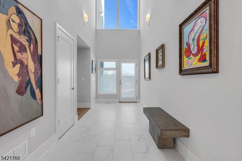 Discover true elegance in this custom built modern home, completed in 2023, nestled on an oversized lot at the end of a tranquil cul de sac in the beautiful community ...