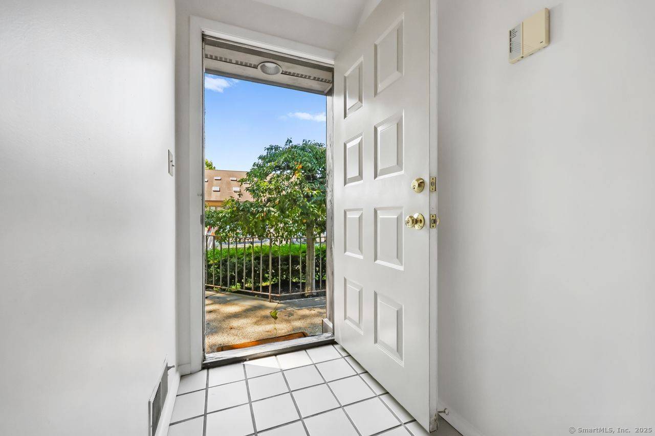 Rare Chesterfield condo with deeded, detached garage with the option to resell separately if desired !