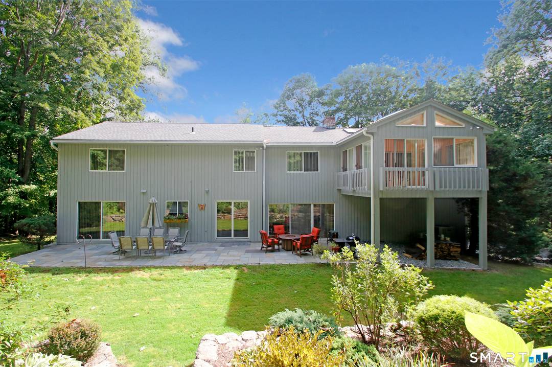 Set on a quiet cul de sac, this light filled contemporary home offers privacy, space, and a functional open layout.